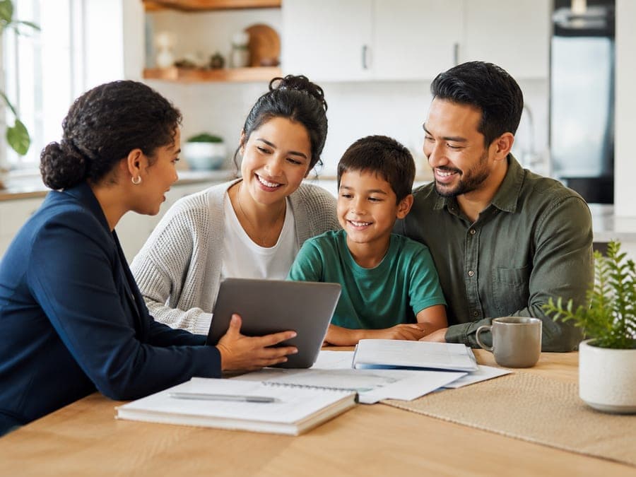 A family reviewing their guided assessment with a care navigator